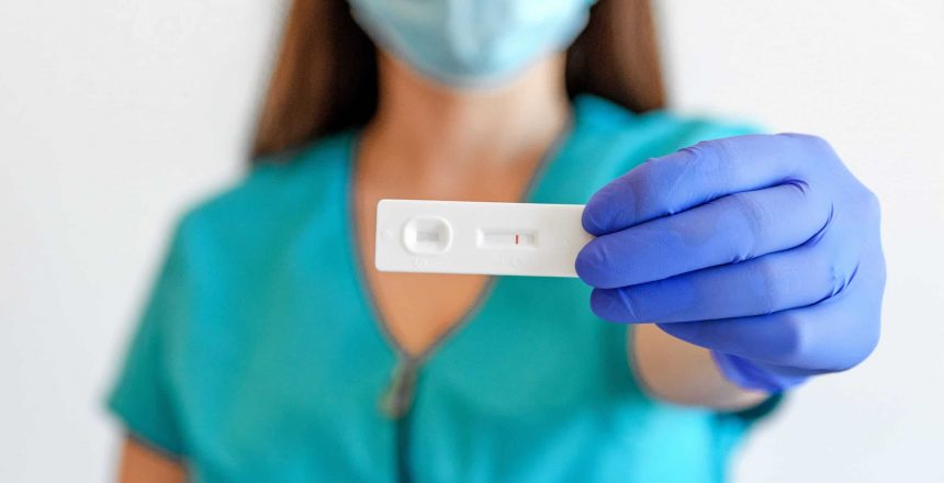 selective-focus-closeup-image-of-doctor-holding-co-55RUGM6